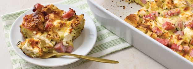 Plate with a slice of everything bagel breakfast casserole.
