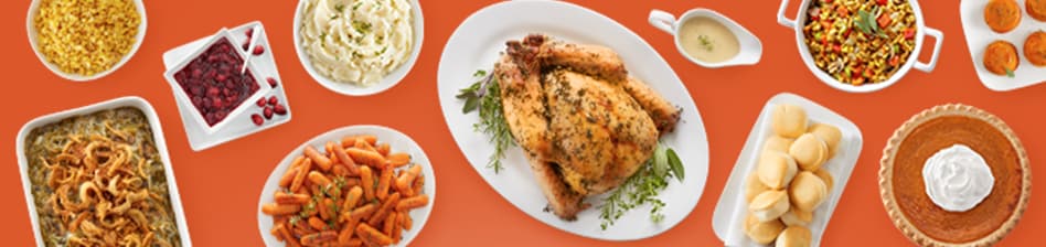 Cooked Thanksgiving turkey, pumpkin pie, green bean casserole, cranberry sauce and more sides.