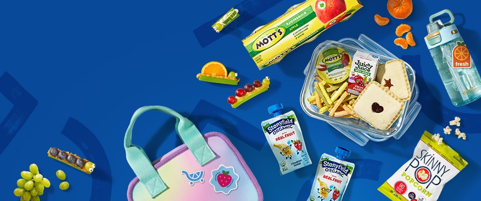 A variety of school supplies on a blue patterned background, including Ticonderoga pencils, Crayola colored pencils, scissors,  glue sticks, erasers, a sticker-covered composition book, and an open backpack with folders and stationery inside