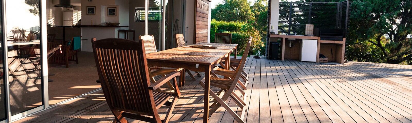 Outdoor patio furniture on a wooden deck Outdoor patio furniture on a wooden deck