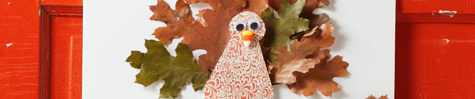Turkey made with craft paper and hung on a red door